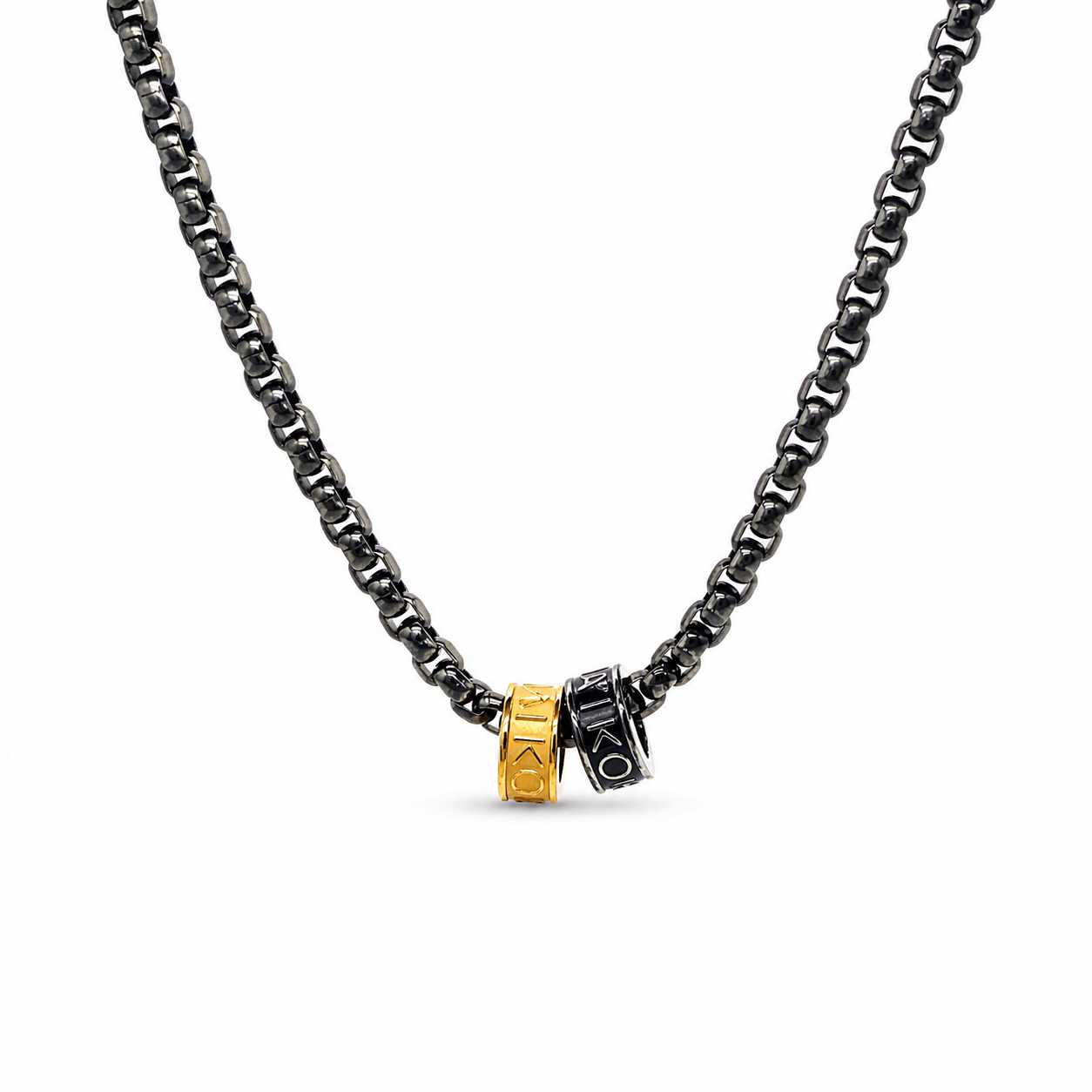 Collier motif IKOBA black-oil et acier dorée